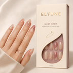 Soft-gel press-ons with delicate pearl and champagne orbit details.